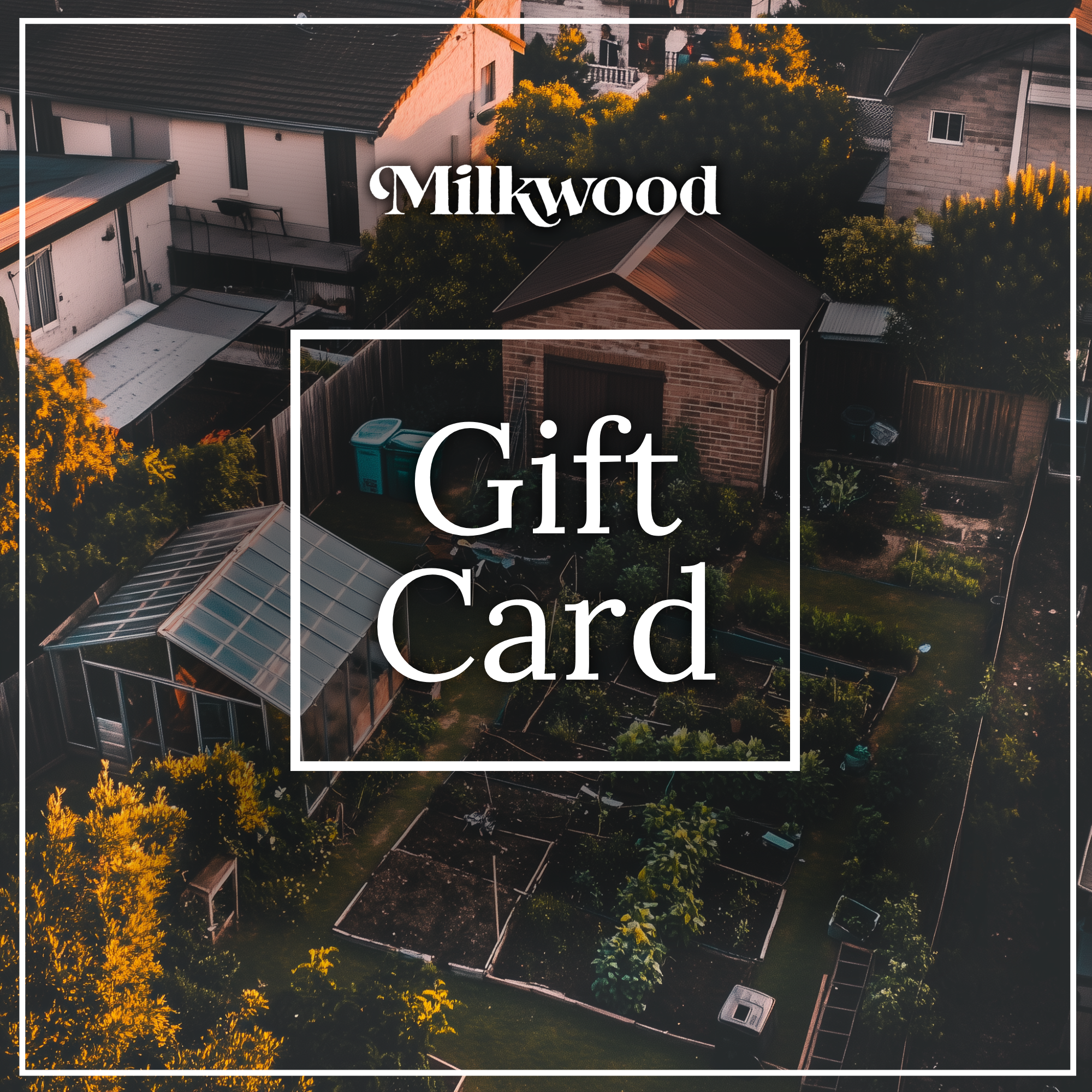 Milkwood Gift Card displayed over an aerial view of a lush backyard garden with greenhouses and garden beds, framed by homes and trees in soft, evening light. The Milkwood logo is at the top, and 'Gift Card' is prominently displayed in the centre in white text.